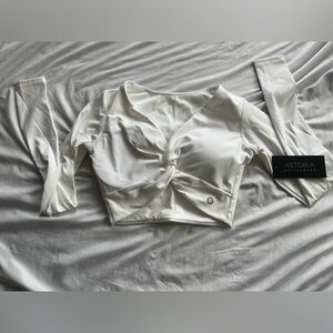 White twisted active top from astoria never worn size small